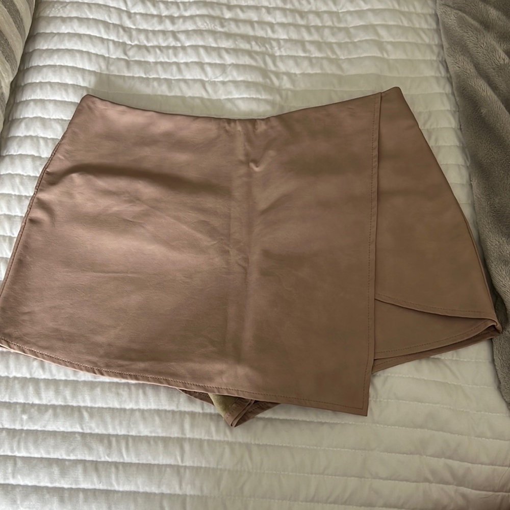 Pink, leather skort.